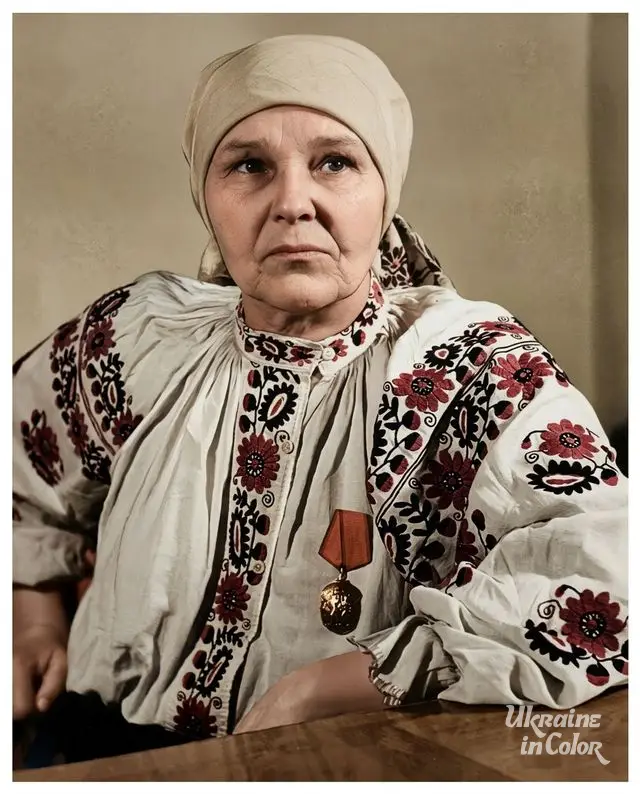 Maria Prymachenko — portrait with a medal in a vyshyvanka