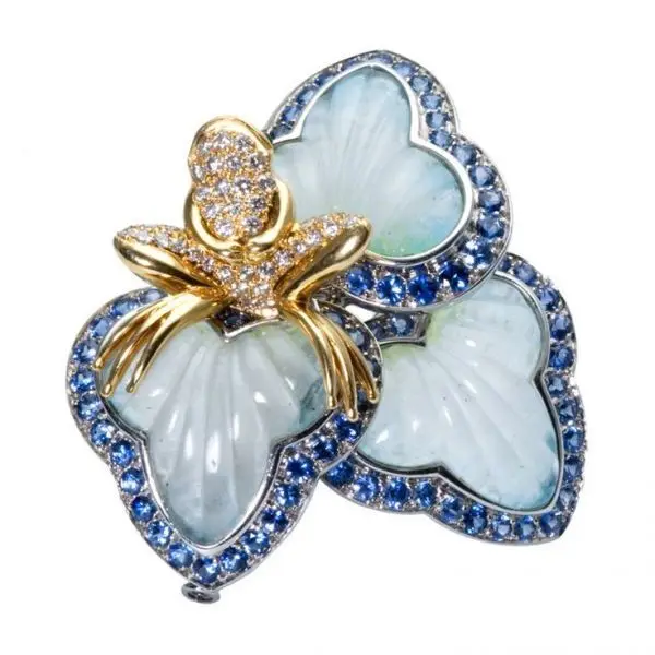 Orchid jewel in carved stone