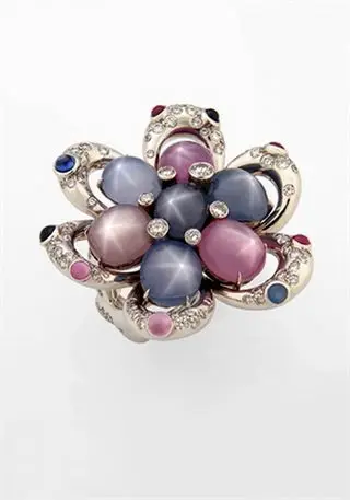 Ring with a cluster of cabochons